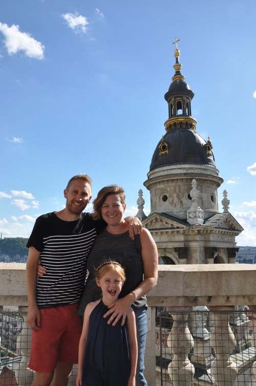 Julie Schumacher, her husband, Brett Burwell, and their 7-year-old daughter